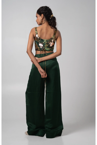 Deep green embroidered corset with wide-leg trousers