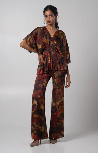 Multicolored V-neck kimono top paired with flared trouser