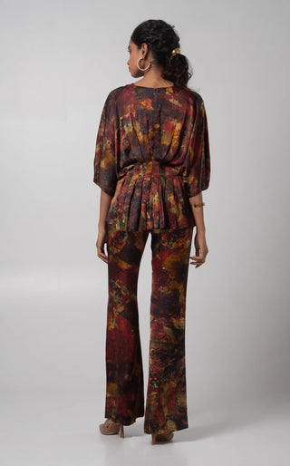 Multicolored V-neck kimono top paired with flared trouser