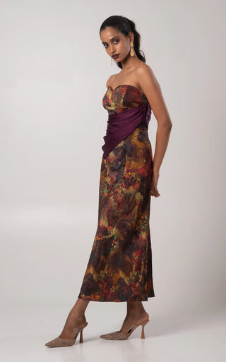 Purple corset paired with a detachable drape and skirt