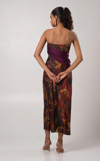 Purple corset paired with a detachable drape and skirt