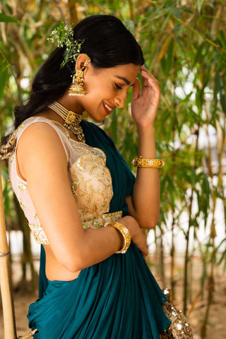 Zuri teal green ruffle saree and blouse