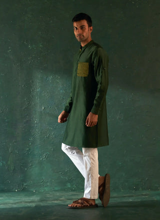 Deep green straight kurta and nehru jacket set