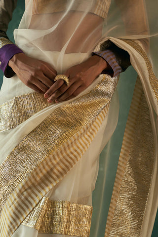 Midas ivory saree and tissue blouse