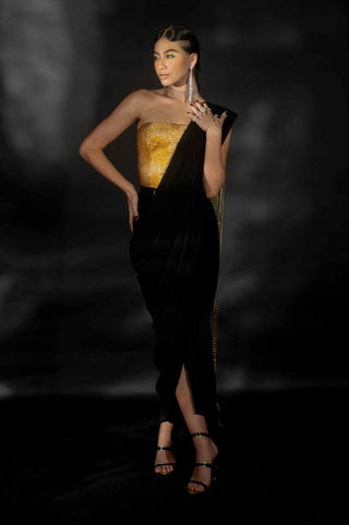 Gold rhinestone corset and black saree