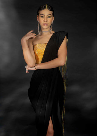 Gold rhinestone corset and black saree