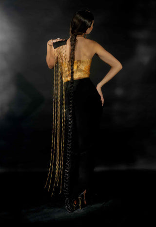 Gold rhinestone corset and black saree