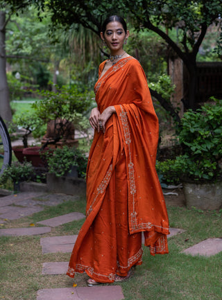 Rust orange embroidered silk saree and blouse