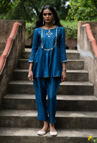 Cobalt blue peplum with straight pants