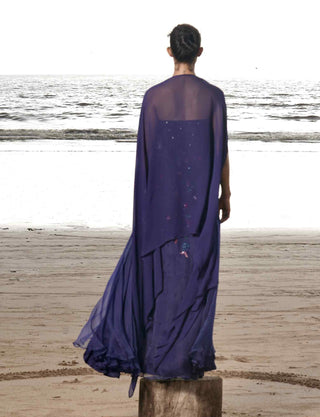 Blue embroidered gown and cape