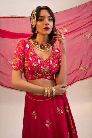 Pink embroidered lehenga, blouse paired with embroidered dupatta