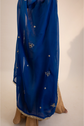 Beige zari tissue gold kurti & garara paired with electric blue dupatta