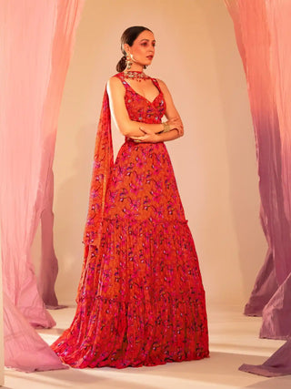 Rust orange printed tiered lehenga set