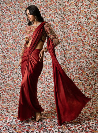 Maroon draped saree paired with printed top