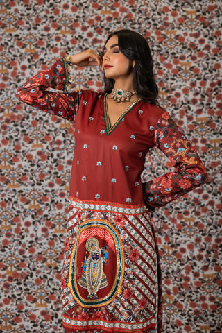 Maroon srinathji kurta paired with printed pants and dupatta