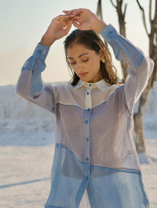 Skyline blue shirt and white pants