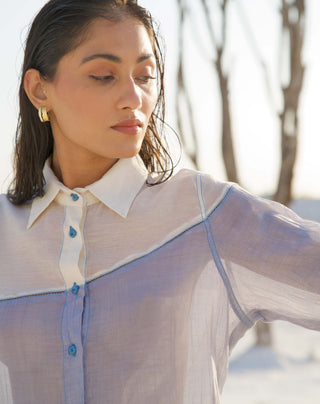 Skyline blue shirt and white pants