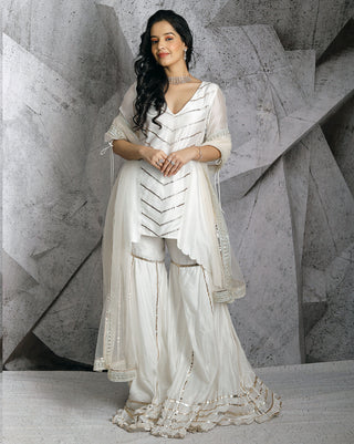 Ivory asymmetrical kurta and sharara set