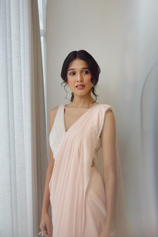 Blush pre-draped saree with crystal embellished blouse