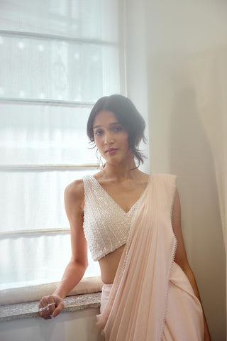 Blush pre-draped saree with crystal embellished blouse