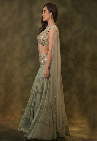 Pastel green tiered mirror lehenga and blouse