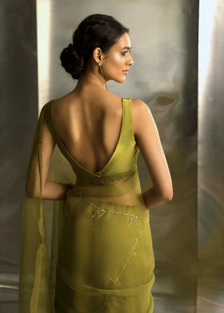 Berry green saree with sleeveless blouse