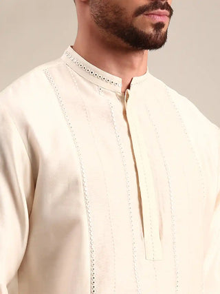 Ivory embroidered chanderi kurta and churidar