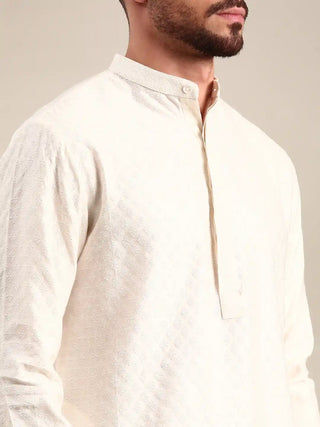 Ivory silk jaquard kurta and churidar