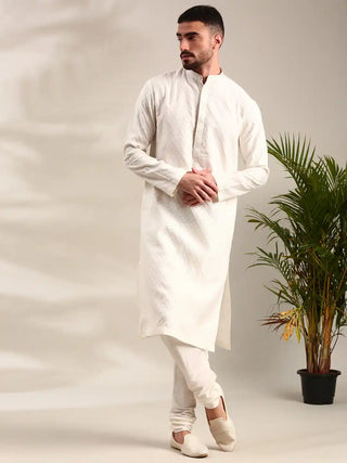 Ivory silk jaquard kurta and churidar