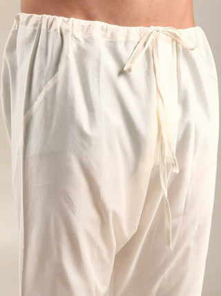 Ivory silk jaquard kurta and churidar