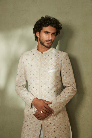 Off-white raw silk sherwani and kurta set