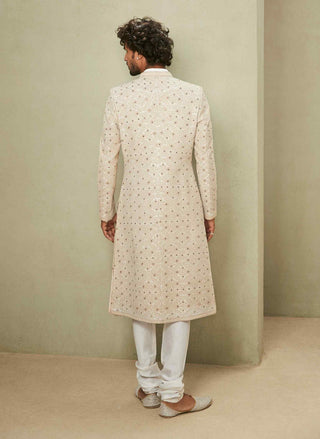 Off-white raw silk sherwani and kurta set