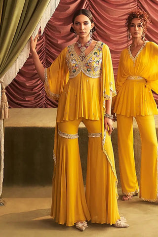 Jyoti yellow embellished peplum and gharara pants