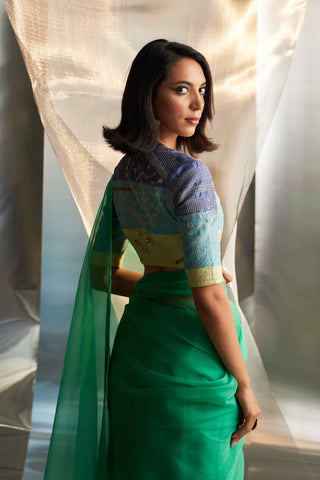 Lush green saree with multicolor blouse