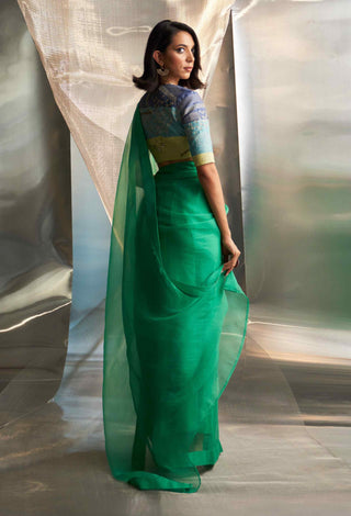 Lush green saree with multicolor blouse