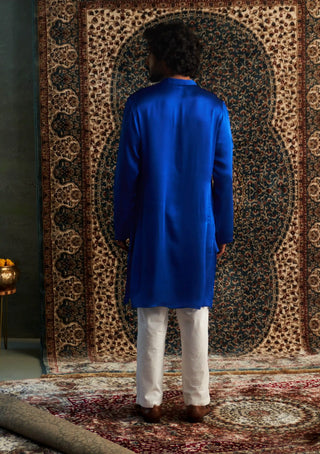 Blue long kurta and white straight trousers