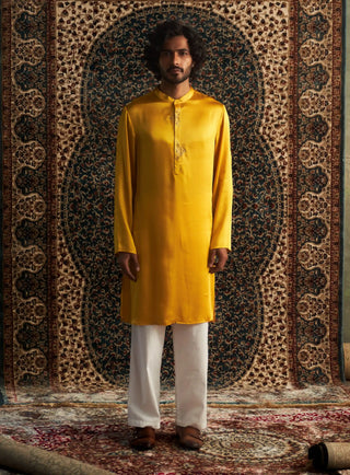 Marigold long kurta and white straight trousers