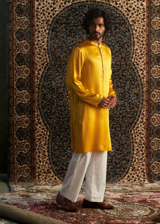 Marigold long kurta and white straight trousers