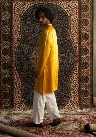 Marigold long kurta and white straight trousers