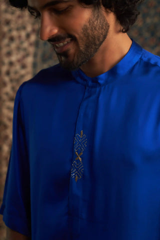 Blue kurta and white pyjamas