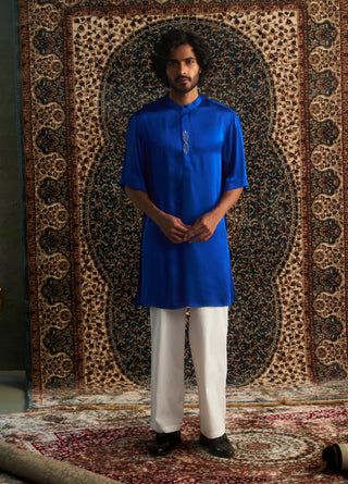 Blue kurta and white pyjamas