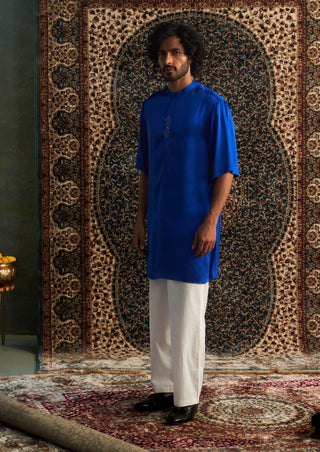 Blue kurta and white pyjamas