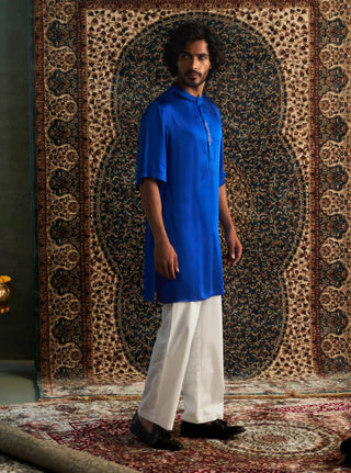 Blue kurta and white pyjamas