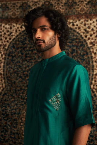 Emerald green kurta and white pyjamas