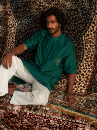 Emerald green kurta and white pyjamas