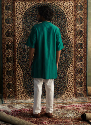 Emerald green kurta and white pyjamas