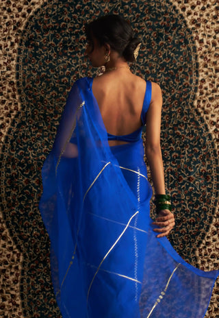 Prarambh blue organza saree and sleeveless blouse