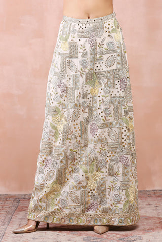 Offwhite applique embroidered choli and skirt