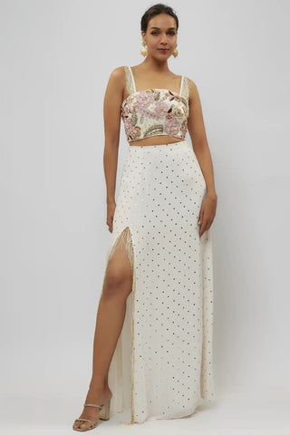 Off-white embroidered choli and slit skirt