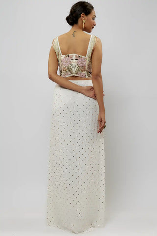 Off-white embroidered choli and slit skirt